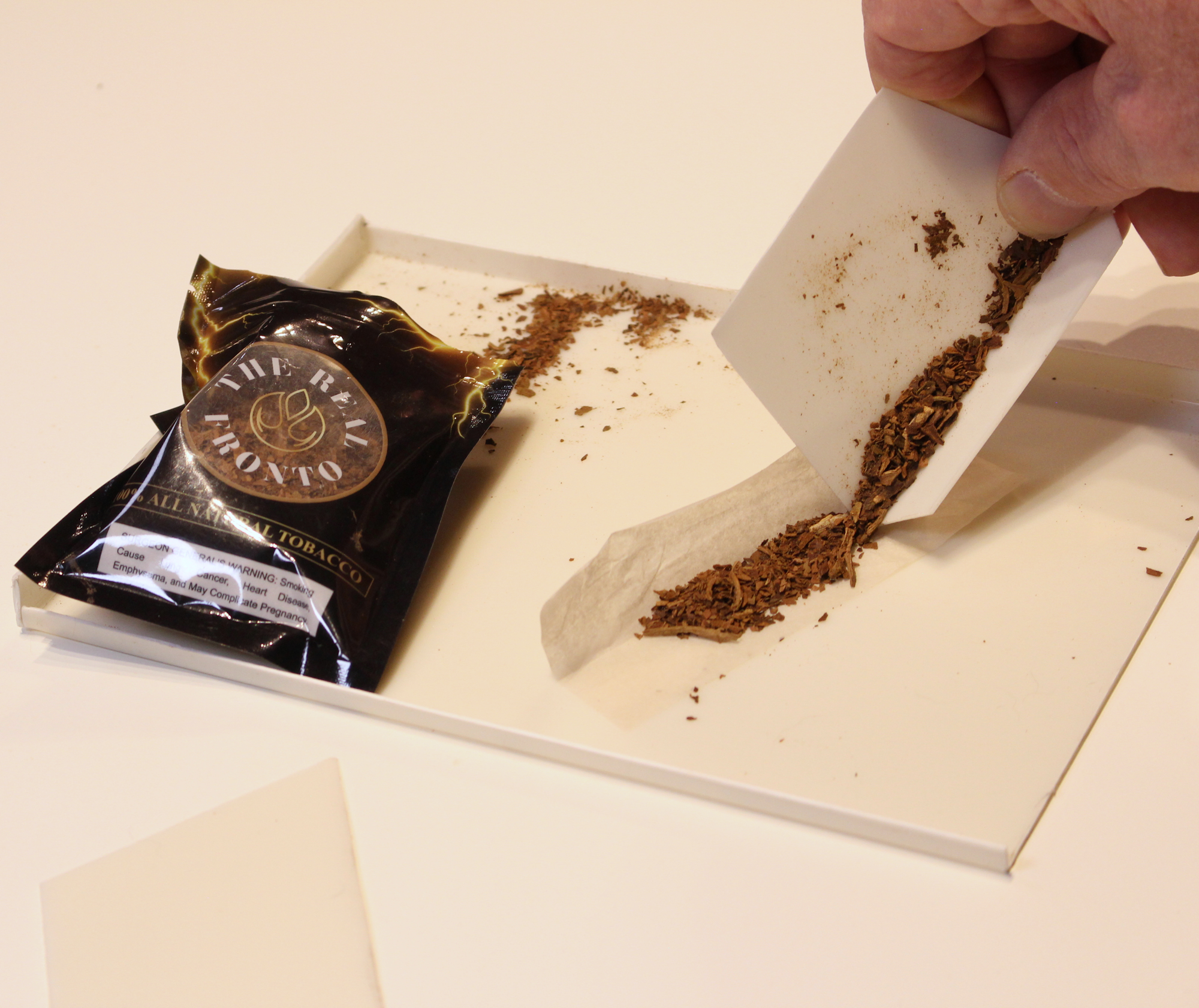 Using scraper on Toker Tray with rolling paper